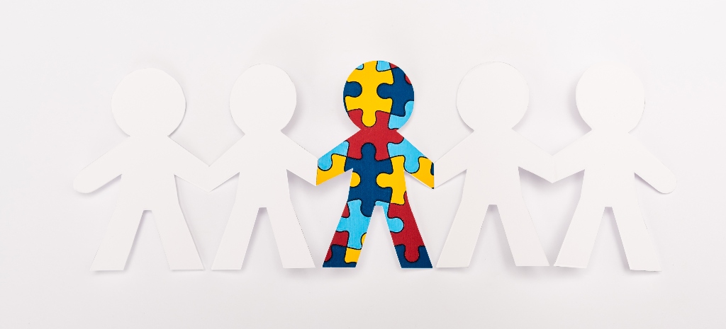 Top view of person with autism among another on white