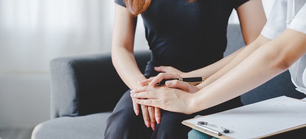 Portrait of female therapist supporting neurodiverse patient