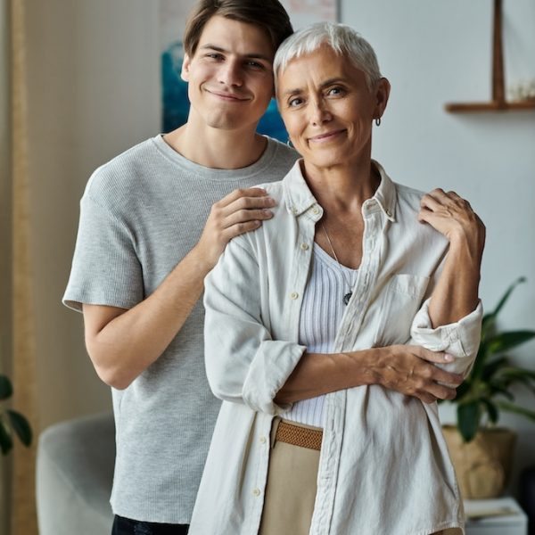 Memory & Cognition Testing in San Diego – KMN Psych Cognitive Testing in San Diego A joyful mother and son share a heartfelt embrace, celebrating their bond in a cozy living room.